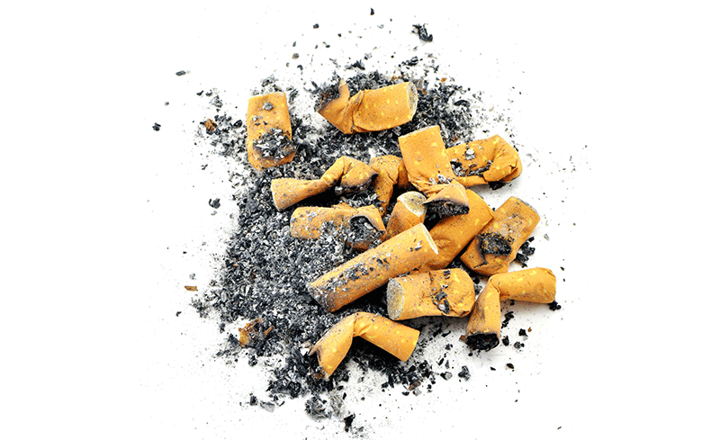 Pile of cigarette ends and ash
